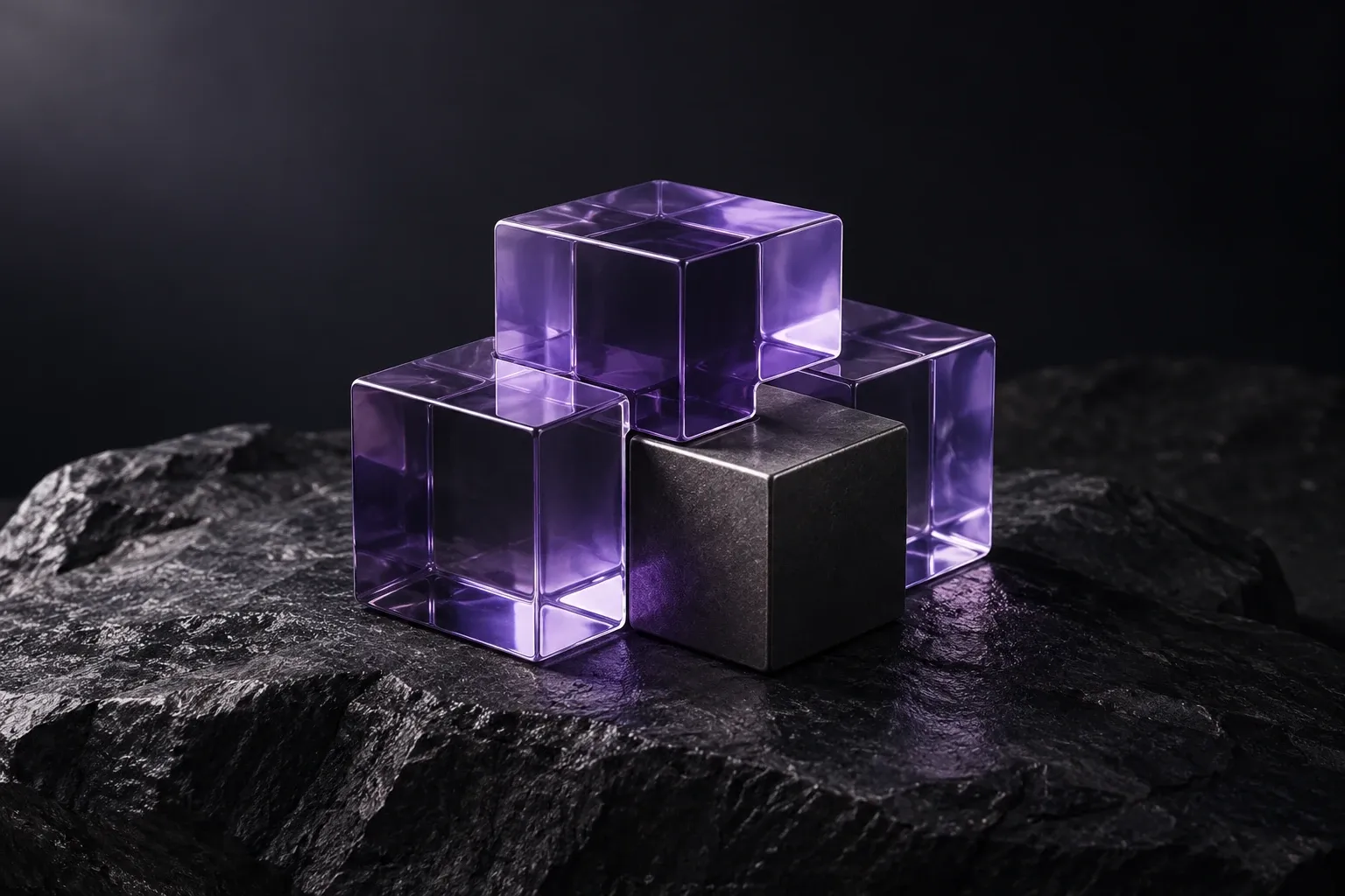 Translucent violet glass blocks arranged on dark stone
